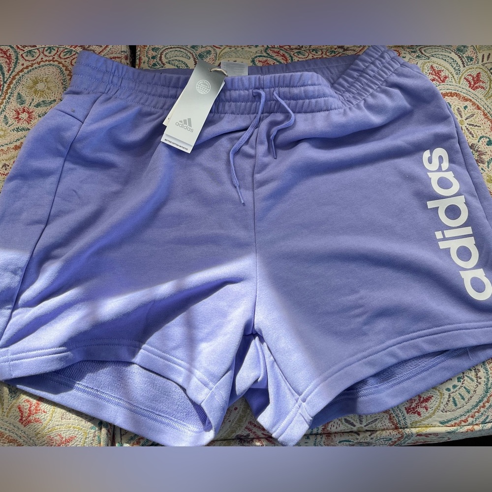 lavender adidas shorts.